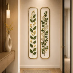 modern vertical pressed leaf wall art with green leaves and yellow floral accents in a small space